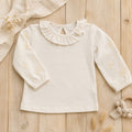 Blusa de algodón con cuello volado y mangas en relieve BB